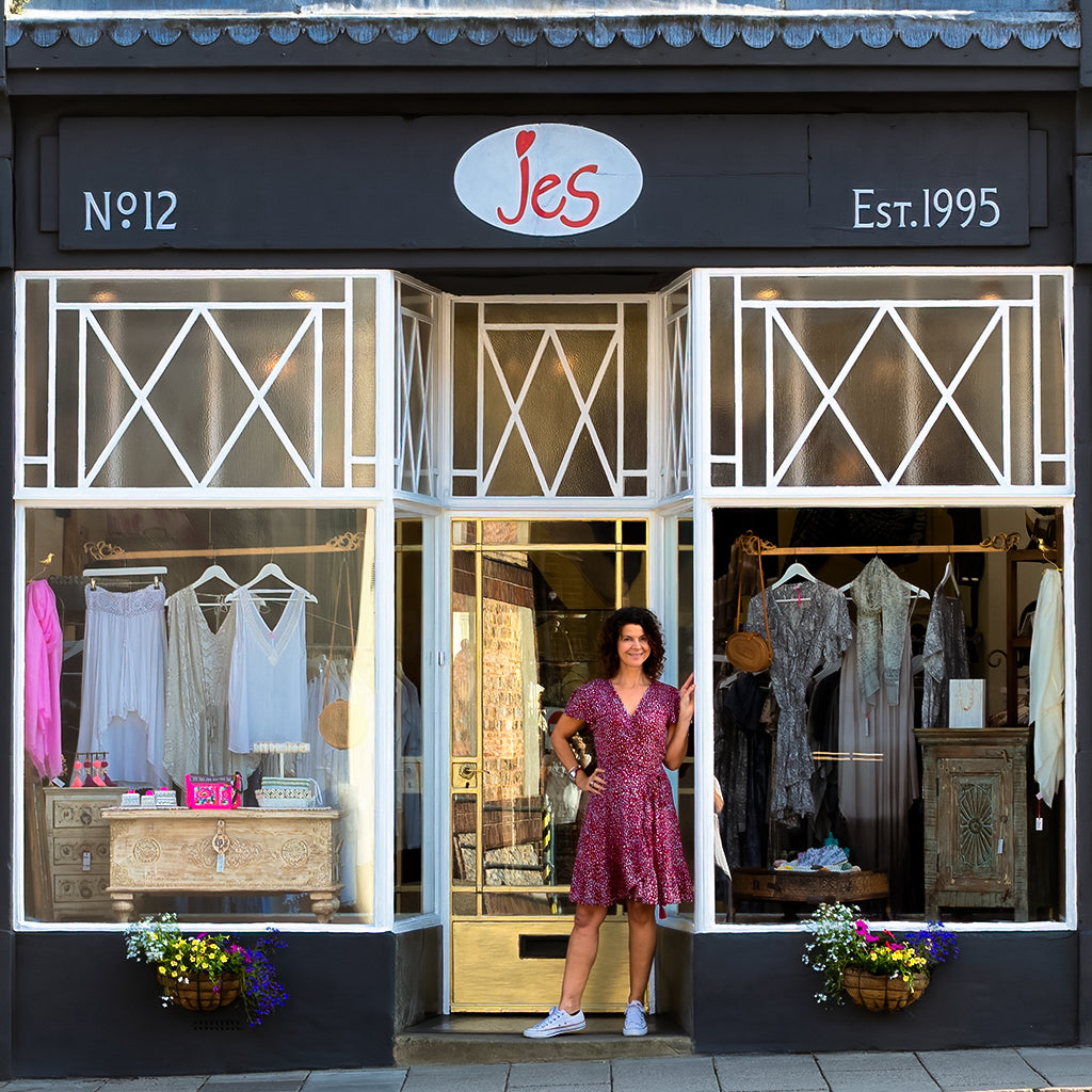 photo of proproiter standing in front of her boutique shop in Colchester named JeS.